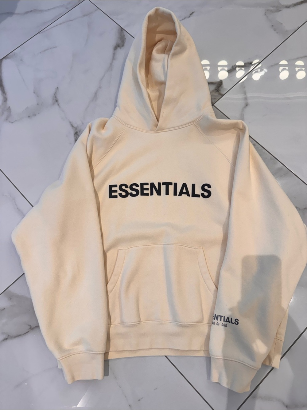 ESSENTIALS Cream Pullover Hoodie with Black Logo